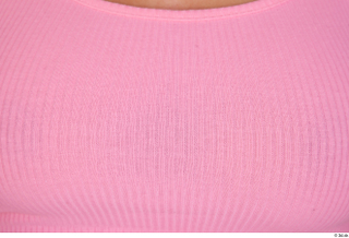 Reeta dressed pink crop top sports upper body 0002.jpg